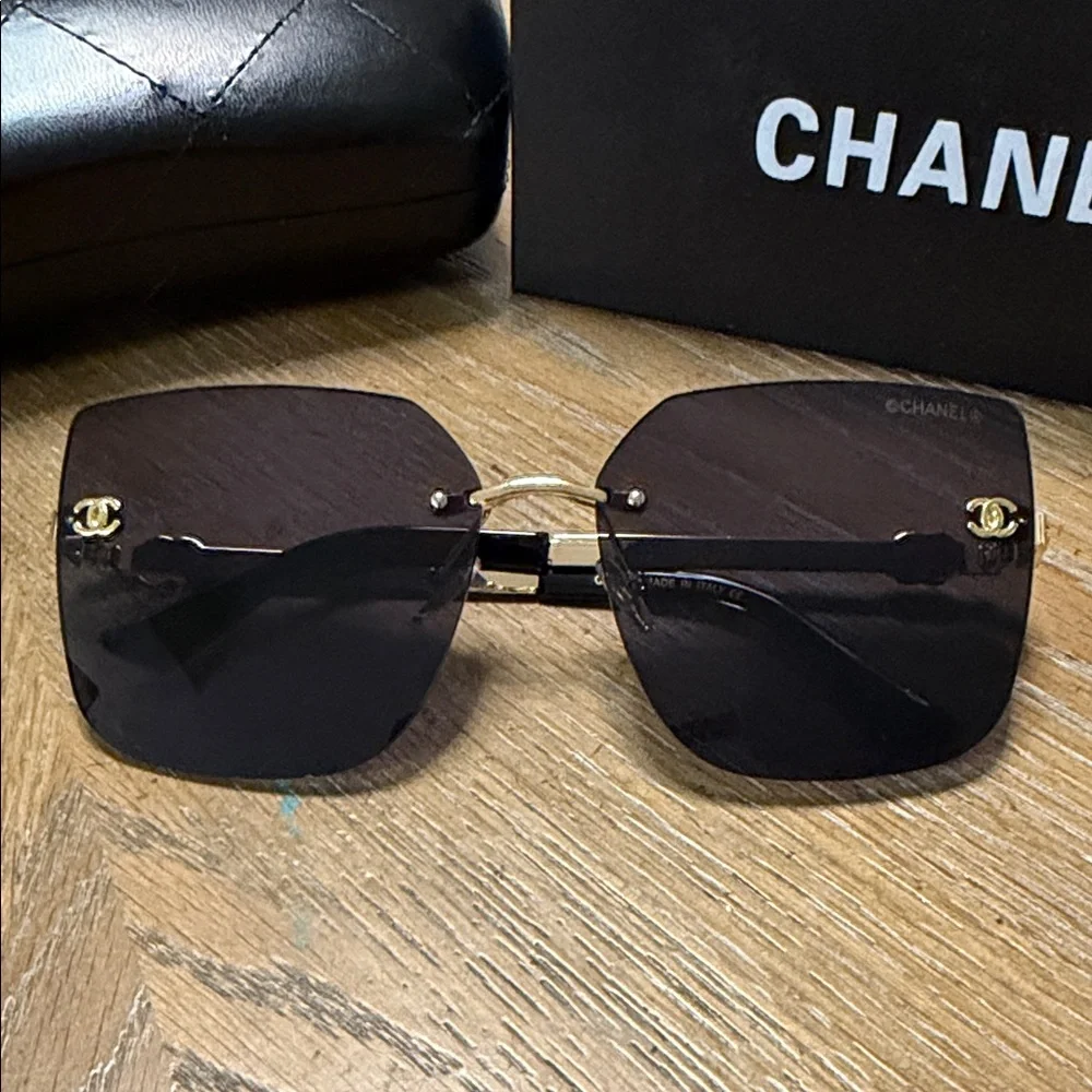 CHANEL Rimless Square Sunglasses in Black with Gold Details